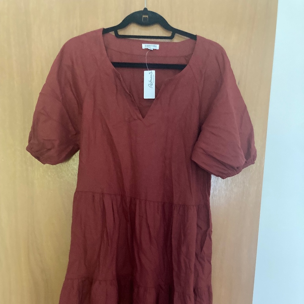 Reitman’s signature red dress